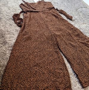 Tagged Temt Australia animal print brown jumpsuit size 08 capri with straps